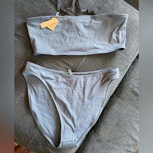 Skims Shaping Swim Bandeau Top and Bikini Bottom in the color Gunmetal